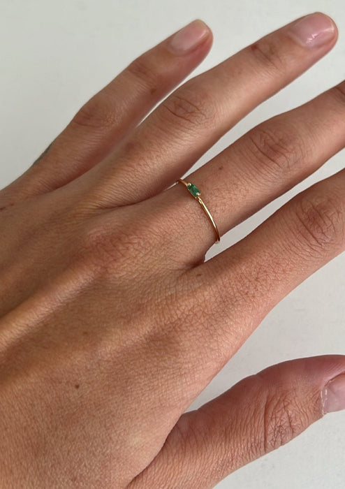 emerald solo baguette ring