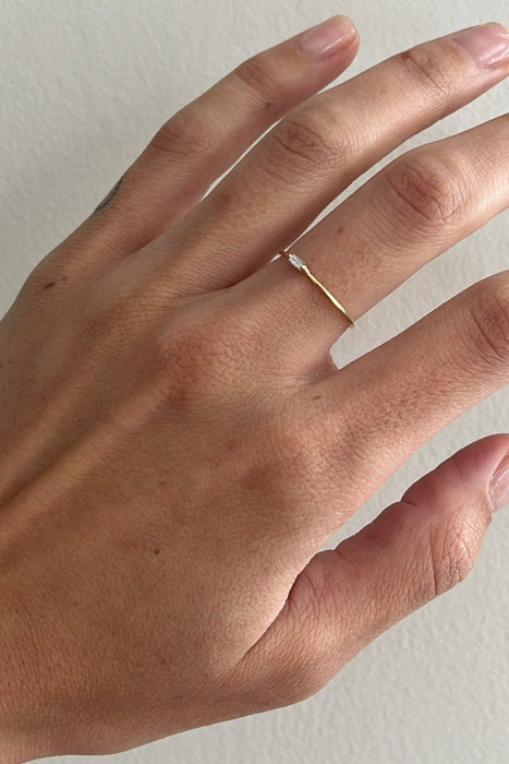 white diamond solo baguette ring