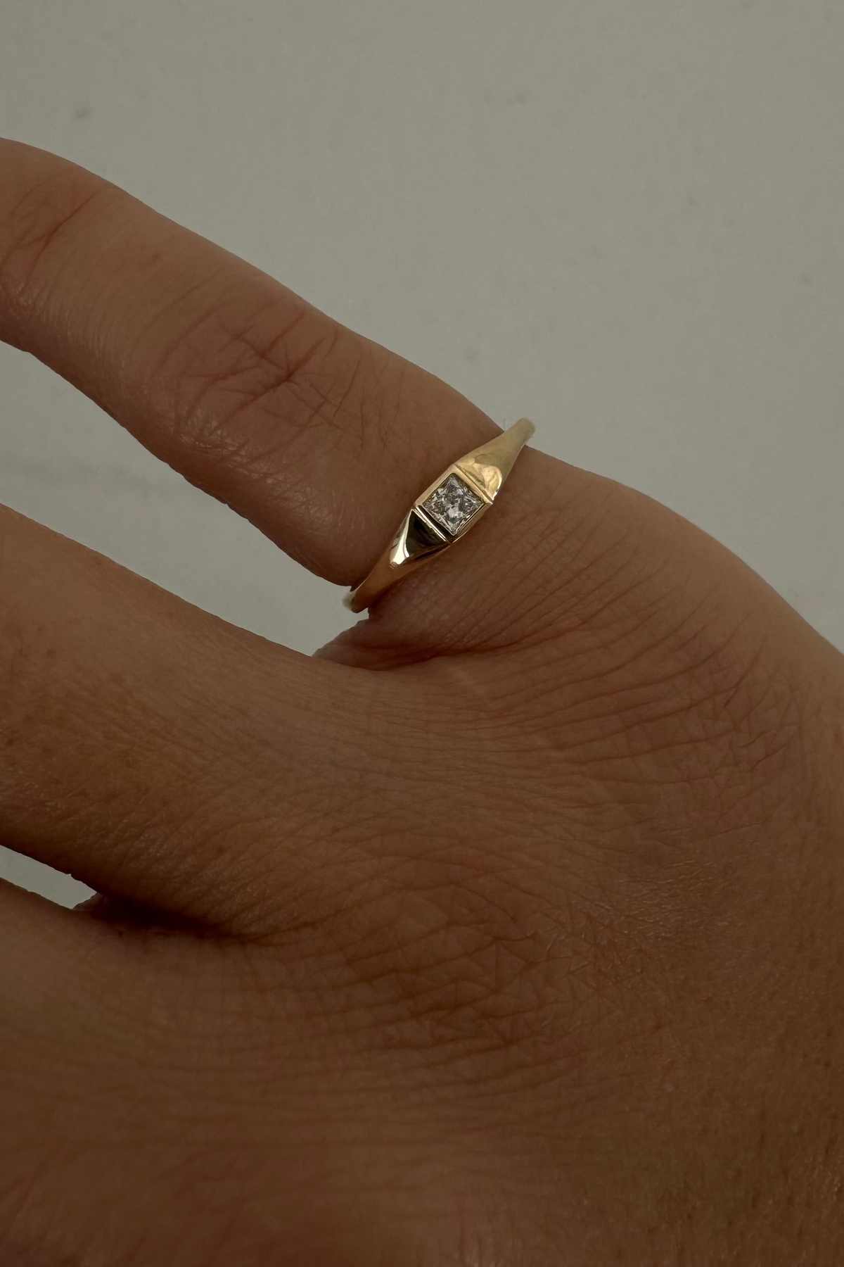 token pinky ring– CCNY