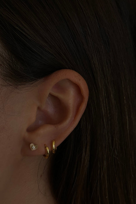 white diamond ribbed heart studs