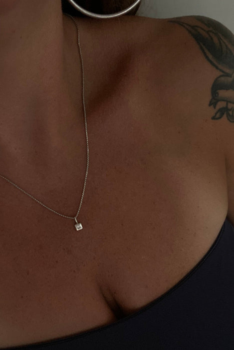 ss token diamond puff necklace