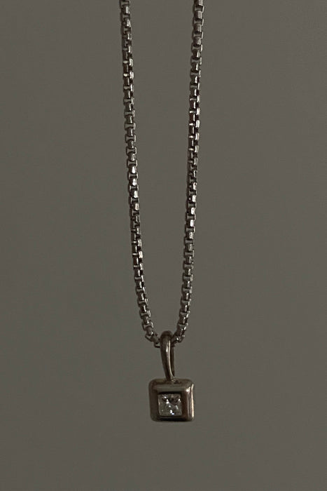ss token diamond puff necklace